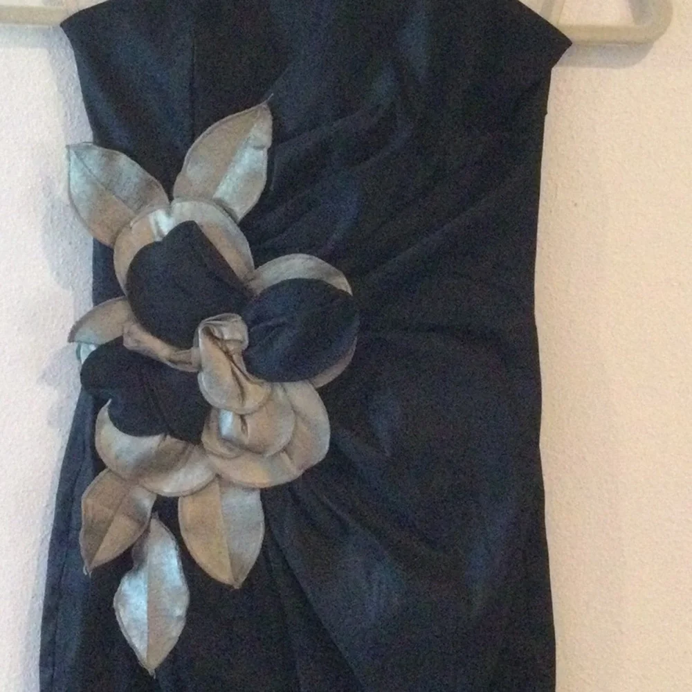 Black strapless size 4 cute mini dress. Great for a special occasion. - Picture 2 of 4